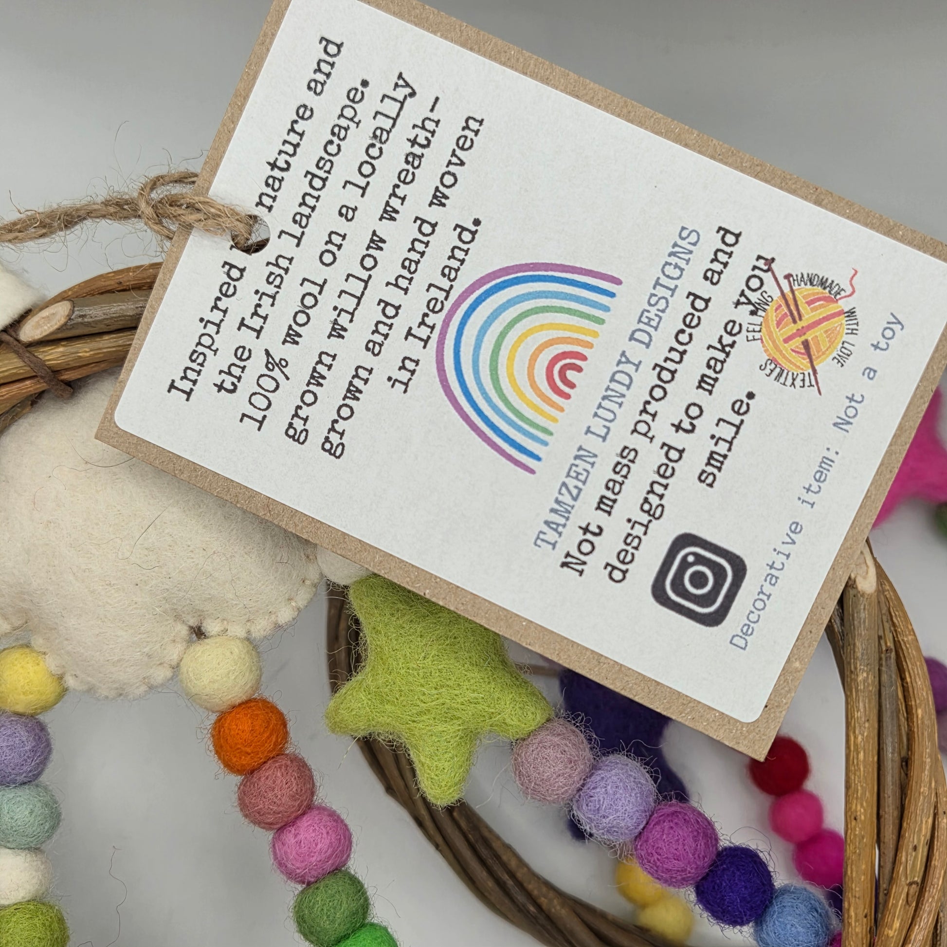 Decorative item with colorful beads and a tag about Irish design and craftsmanship.