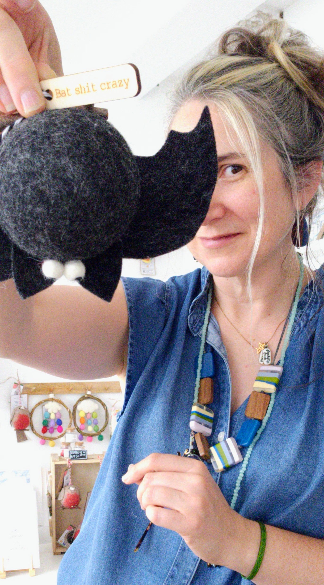 Tamzen ( woman) holding a felted bat