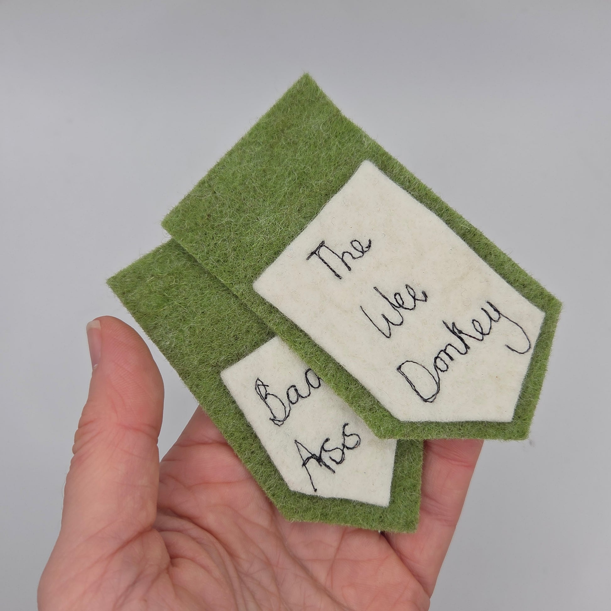 bad ass and wee donkey tags